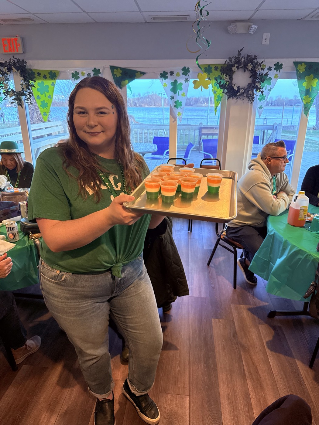 Members enjoying a St. Patrick's Day event in the Pennsylvania Yacht Club hall